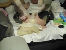 Rubber-Sissy changing her soaken diaper